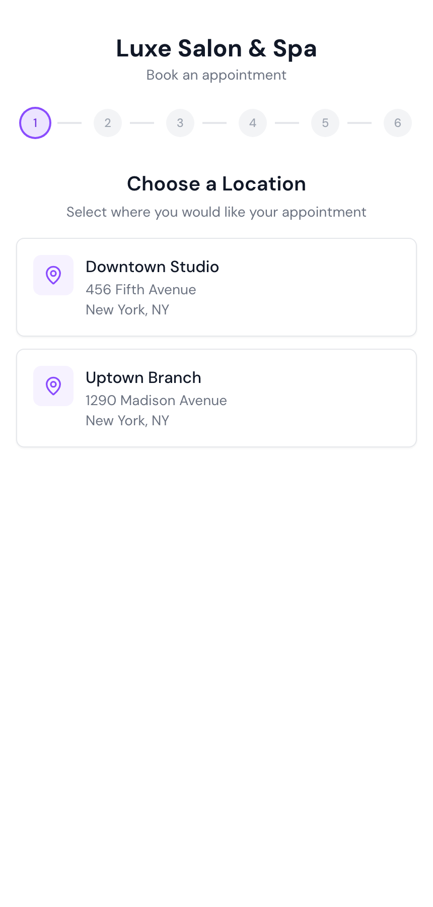 A salon's branded public booking page on a phone